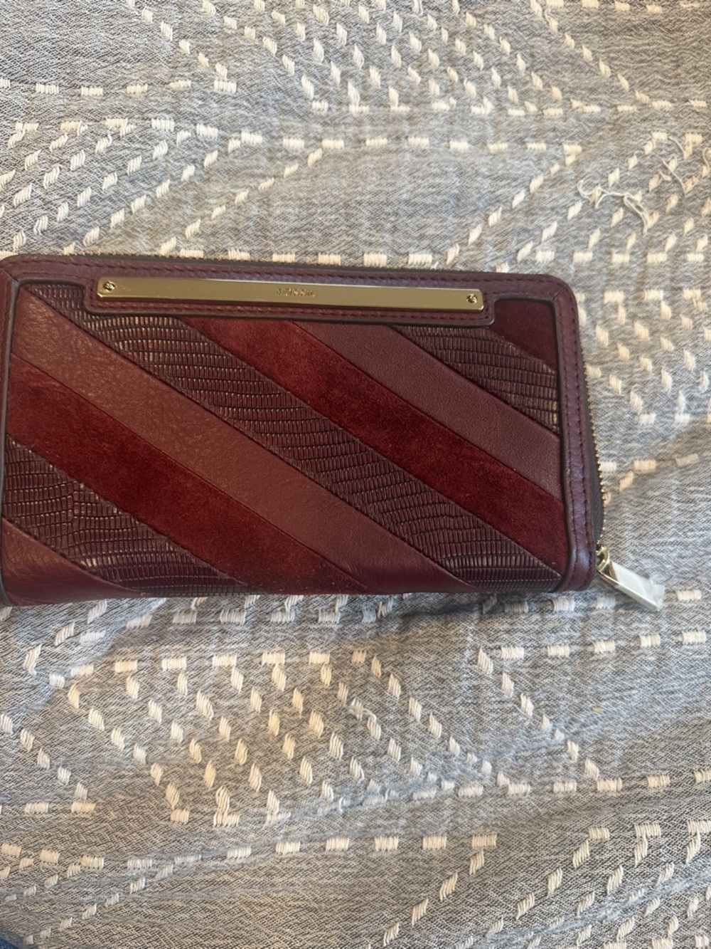 Fossil Burgundy Leather Zip-Around Wallet with Gold Zipper
